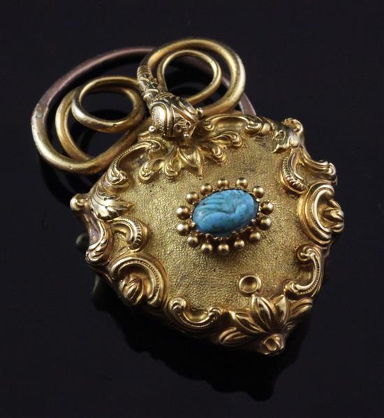 A Victorian gold and turquoise set heart shaped pendant locket, approx. 1.5in.